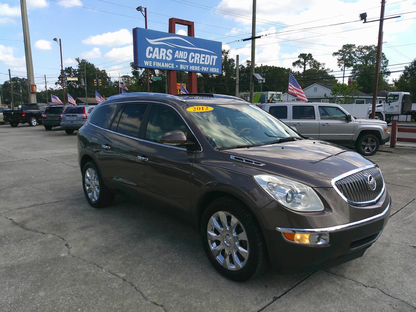 2012 BROWN BUICK ENCLAVE PREMIUM (5GAKRDED3CJ) , located at 1200 Cassat Avenue, Jacksonville, FL, 32205, (904) 695-1885, 30.302404, -81.731033 - Photo#2